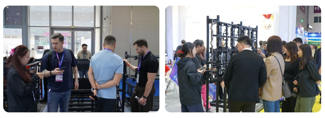 Visitors exploring LED display support systems at GF-Truss